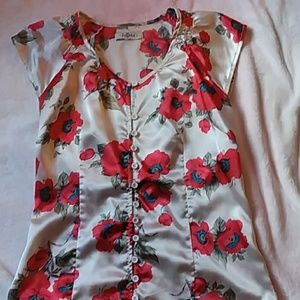 Gently used silky blouse for work or play.